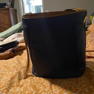 Large tote bag with matching wallet.